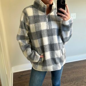 Sherpa checked quarter zip